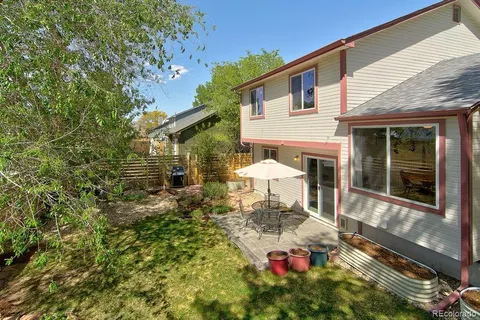 a front view of a house with yard