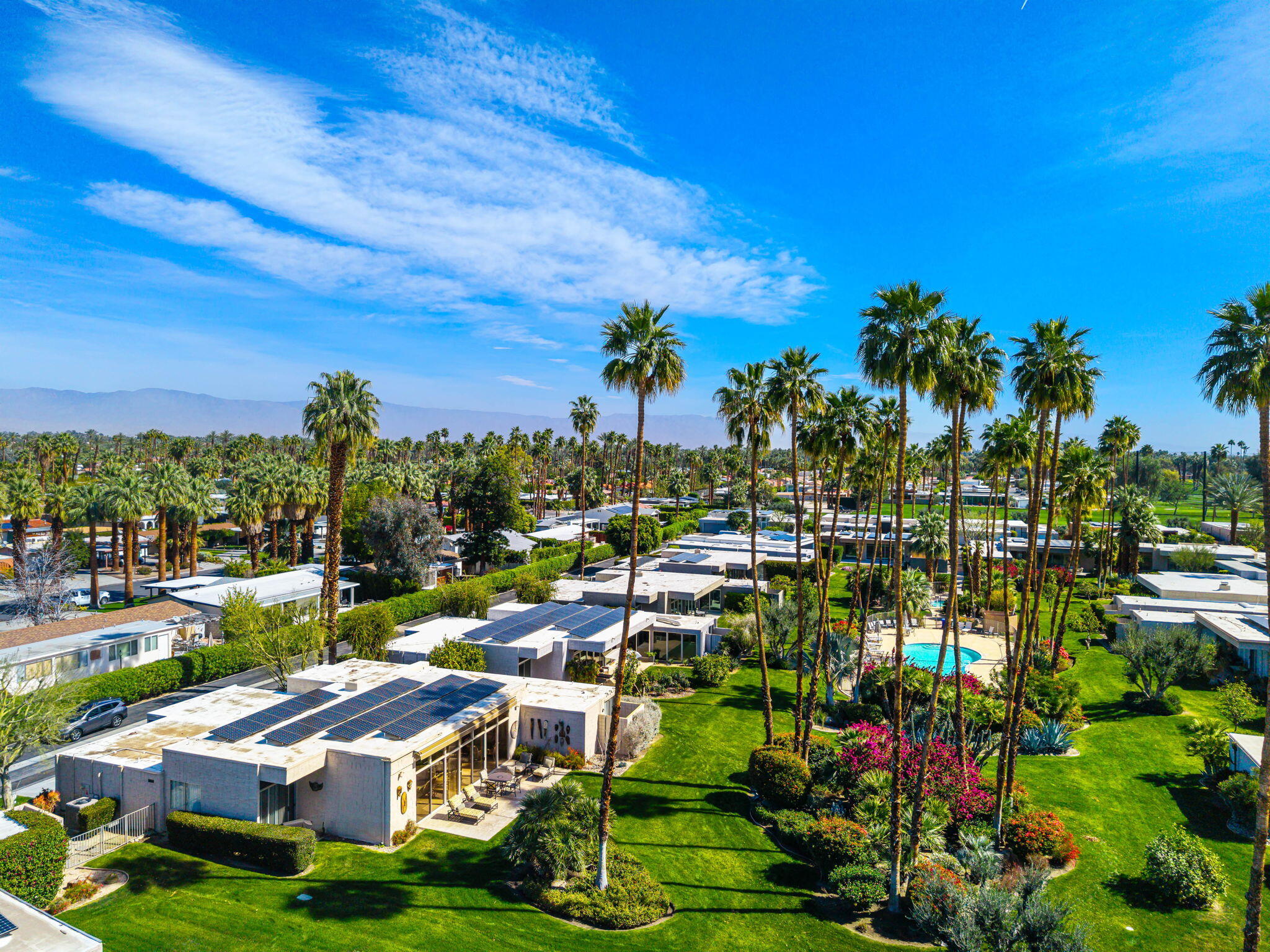 1408 Tamarisk W Street Rancho Mirage, CA 92270 - Photo 1 of 43 a view of a lake with outdoor space
