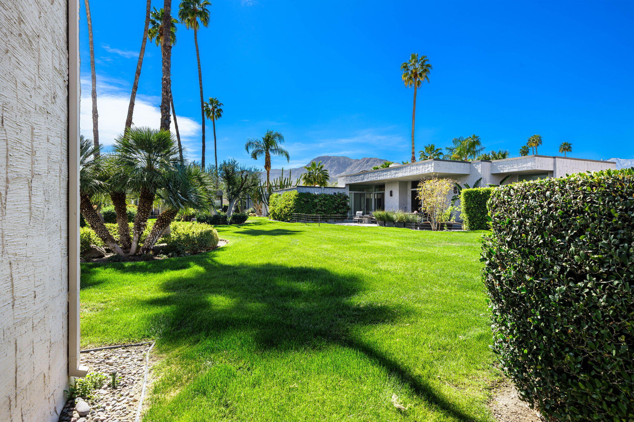 1408 Tamarisk W Street Rancho Mirage, CA 92270 - Photo 25 of 43 a view of a house with a big yard