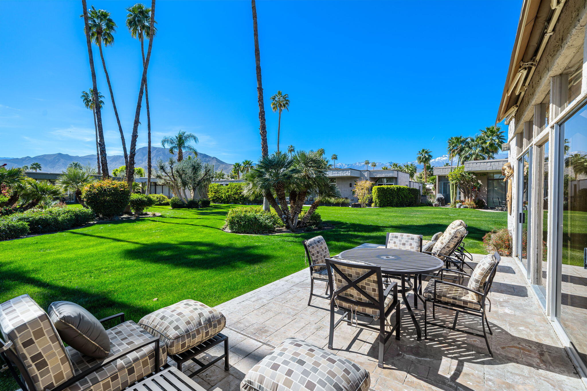 1408 Tamarisk W Street Rancho Mirage, CA 92270 - Photo 28 of 43 a view of a backyard with sitting area