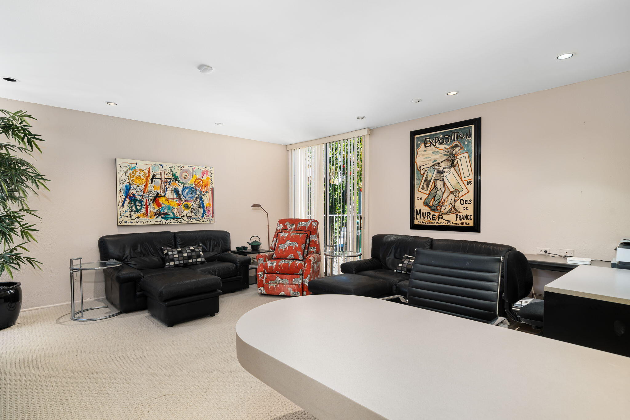 1408 Tamarisk W Street Rancho Mirage, CA 92270 - Photo 37 of 43 a living room with furniture and a window
