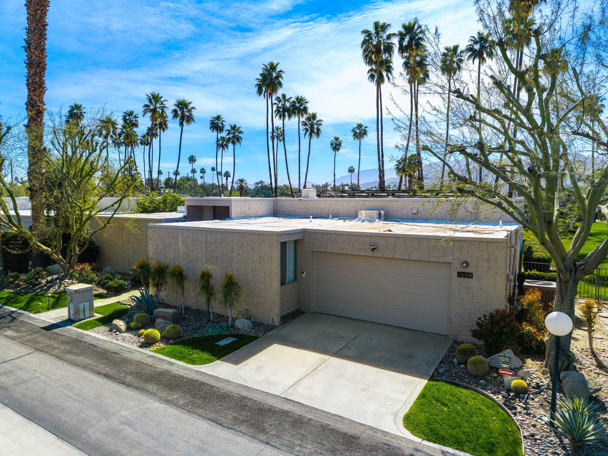 1408 Tamarisk W Street Rancho Mirage, CA 92270 - Photo 4 of 43 a view of outdoor space and yard
