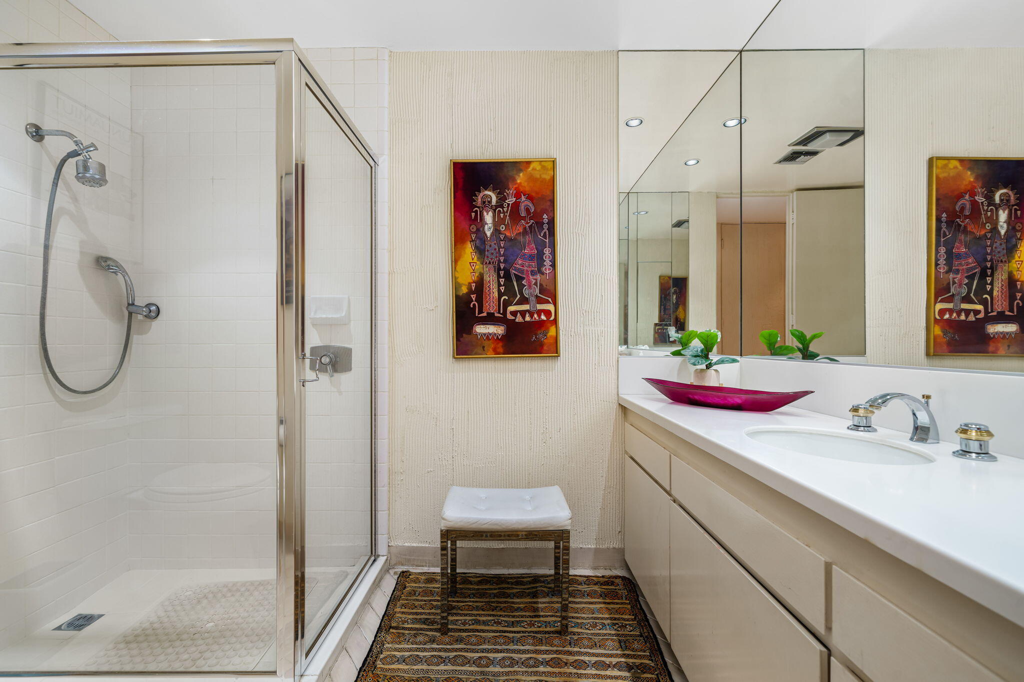 1408 Tamarisk W Street Rancho Mirage, CA 92270 - Photo 41 of 43 a bathroom with a sink and a mirror