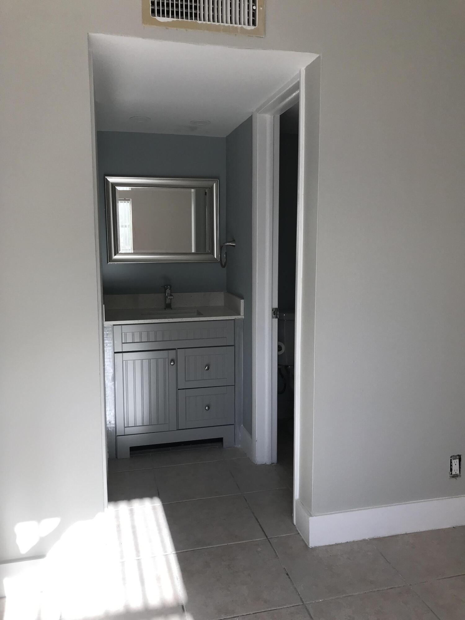 618 Northwest 13th Street, Unit 28 Boca Raton, FL 33486 - Photo 5 of 7 IMG_5716