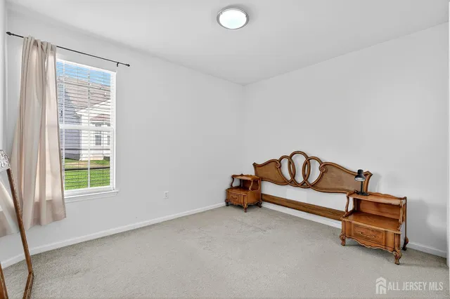a utility room with sink dryer and washer