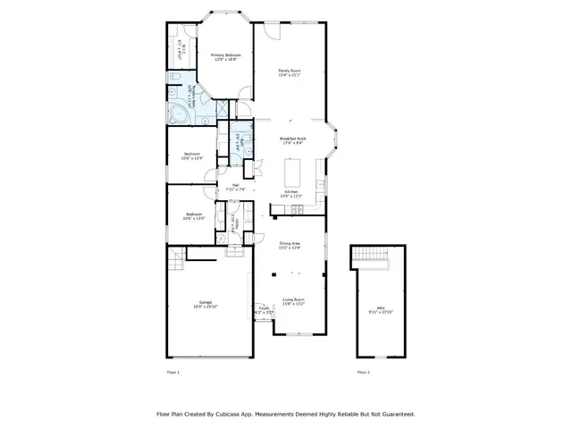 a kitchen with appliances a sink and cabinets