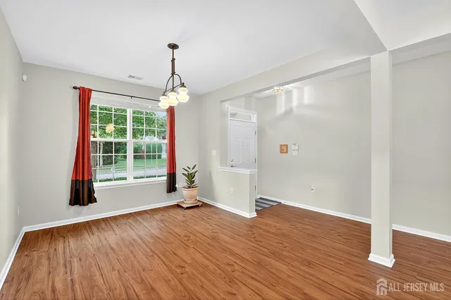 a view of livingroom with hardwood floor and window