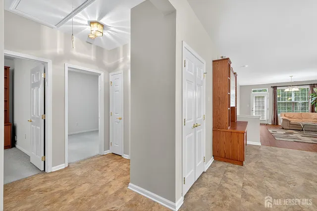 a kitchen with stainless steel appliances granite countertop a refrigerator sink and microwave