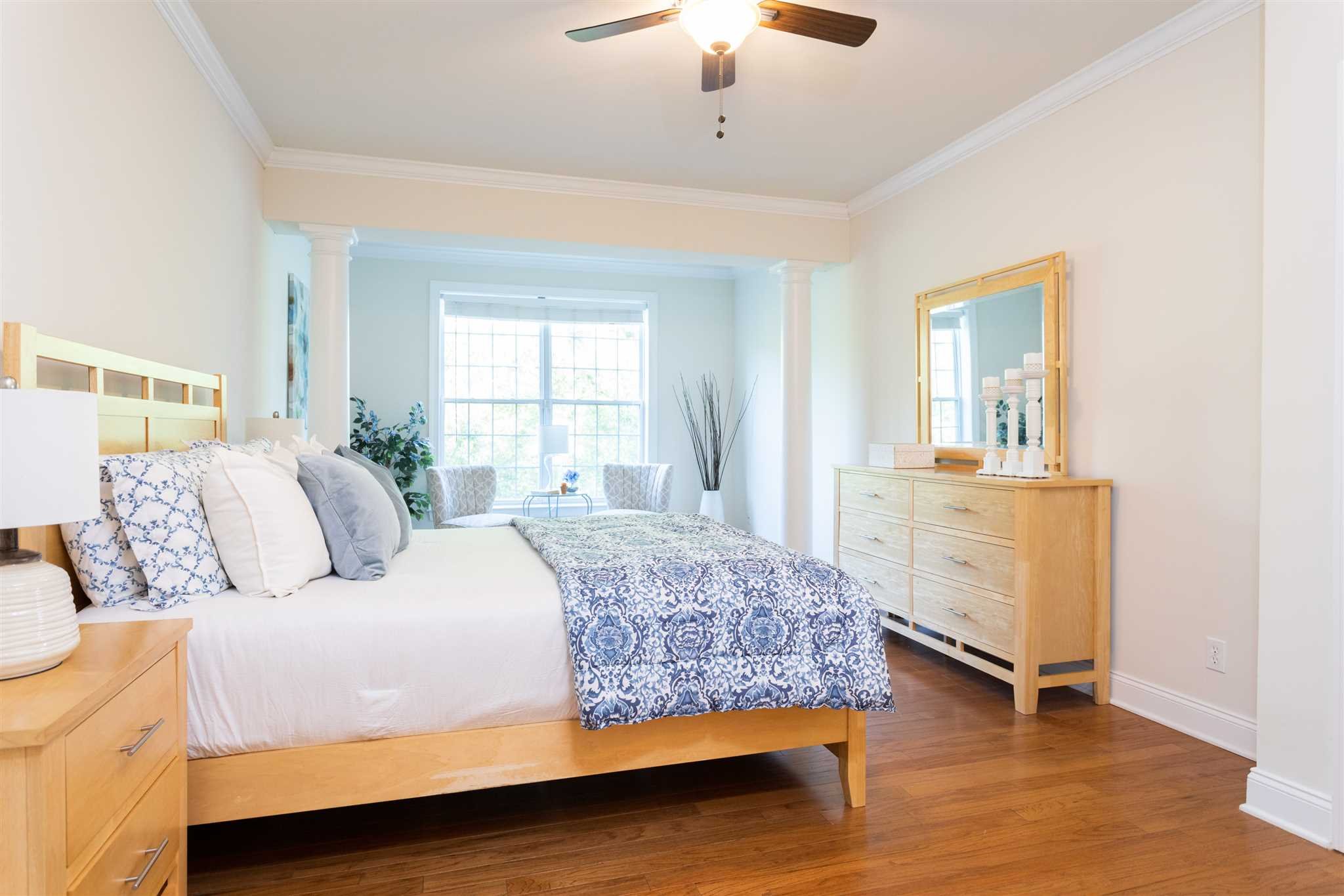 224 Regency Drive, Unit 224 Fishkill, NY 12524 - Photo 16 of 30 a bedroom with a bed and a dresser