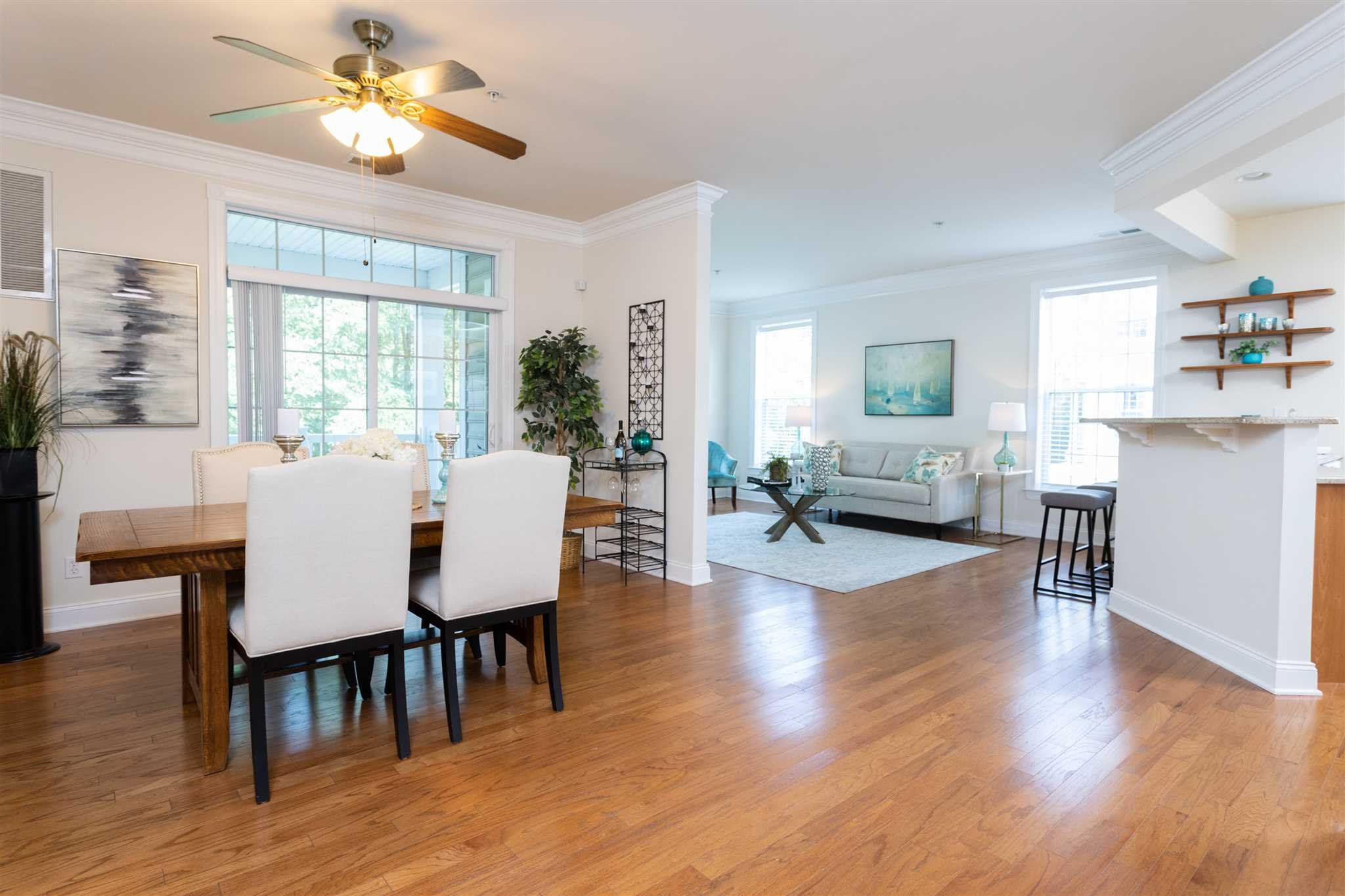 224 Regency Drive, Unit 224 Fishkill, NY 12524 - Photo 20 of 30 a view of a dining room with furniture window and wooden floor