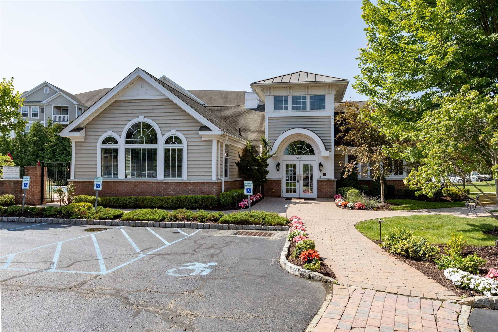 224 Regency Drive, Unit 224 Fishkill, NY 12524 - Photo 21 of 30 a front view of a house with a yard