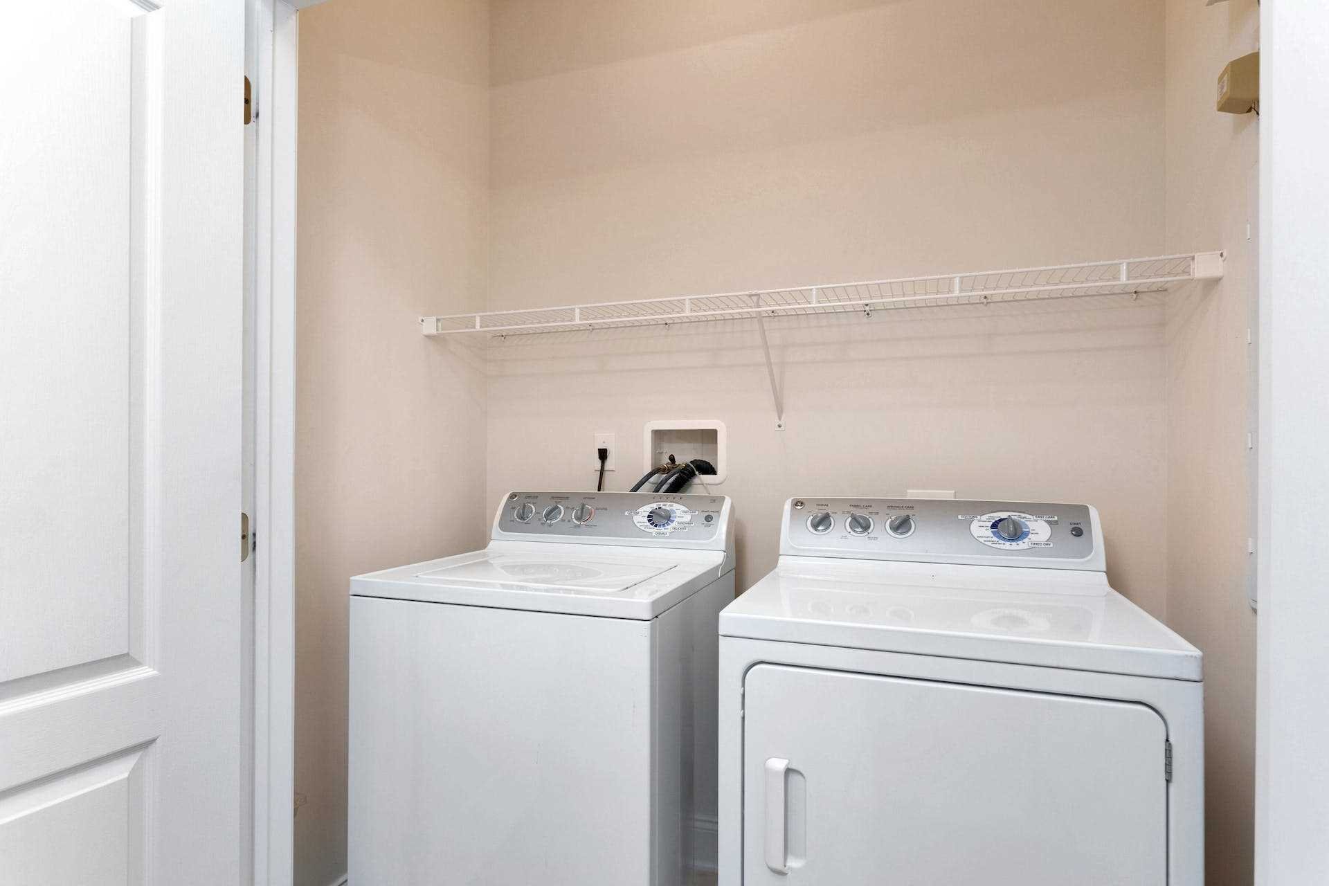 224 Regency Drive, Unit 224 Fishkill, NY 12524 - Photo 3 of 30 a utility room with dryer and washer