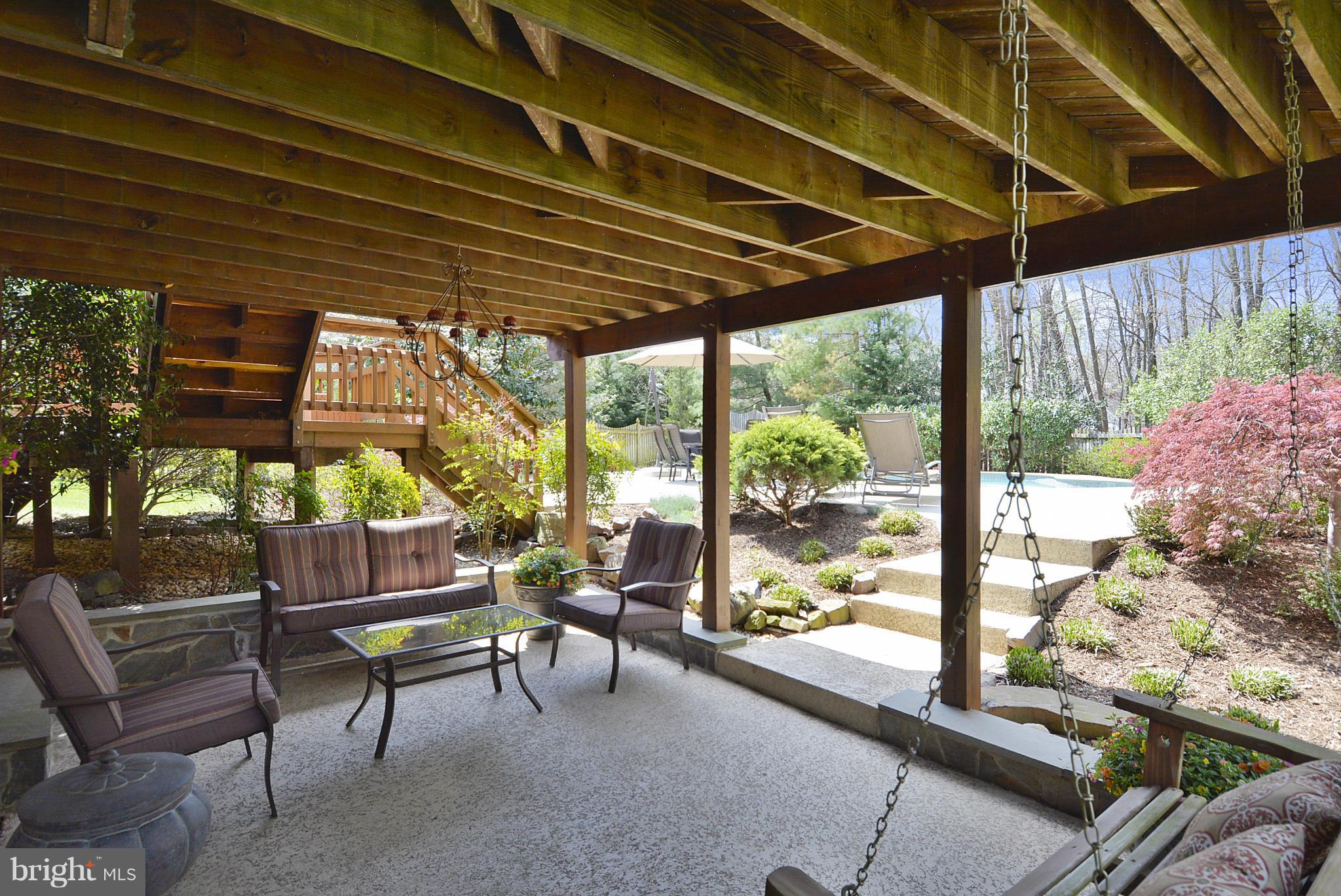 12209 Windsor Hall Way Herndon, VA 20170 - Photo 28 of 30 A COZY SHADED SITTING AREA NEAR THE POOL
