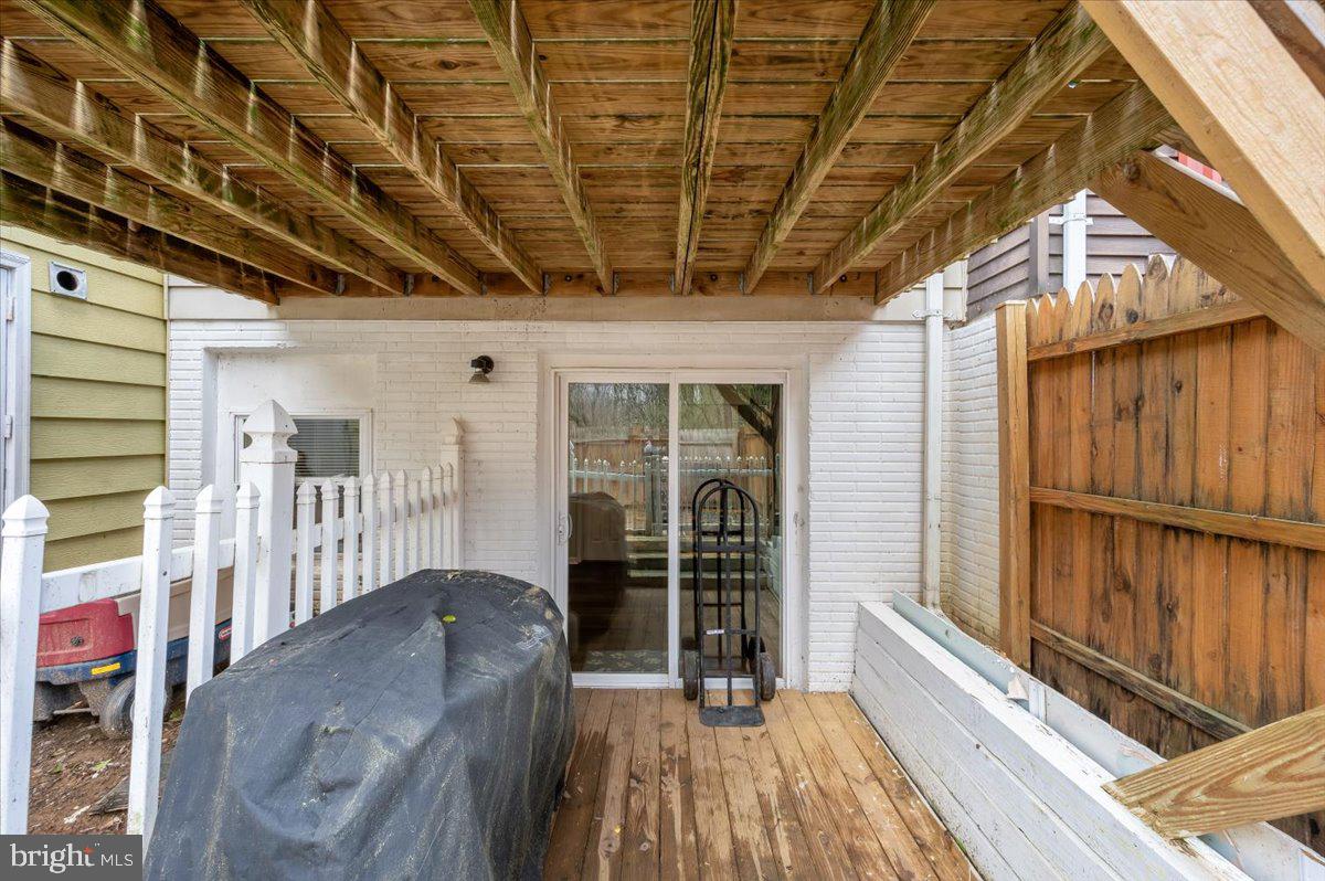 1864 Murdock Court Frederick, MD 21702 - Photo 37 of 39 a view of a porch with wooden floor
