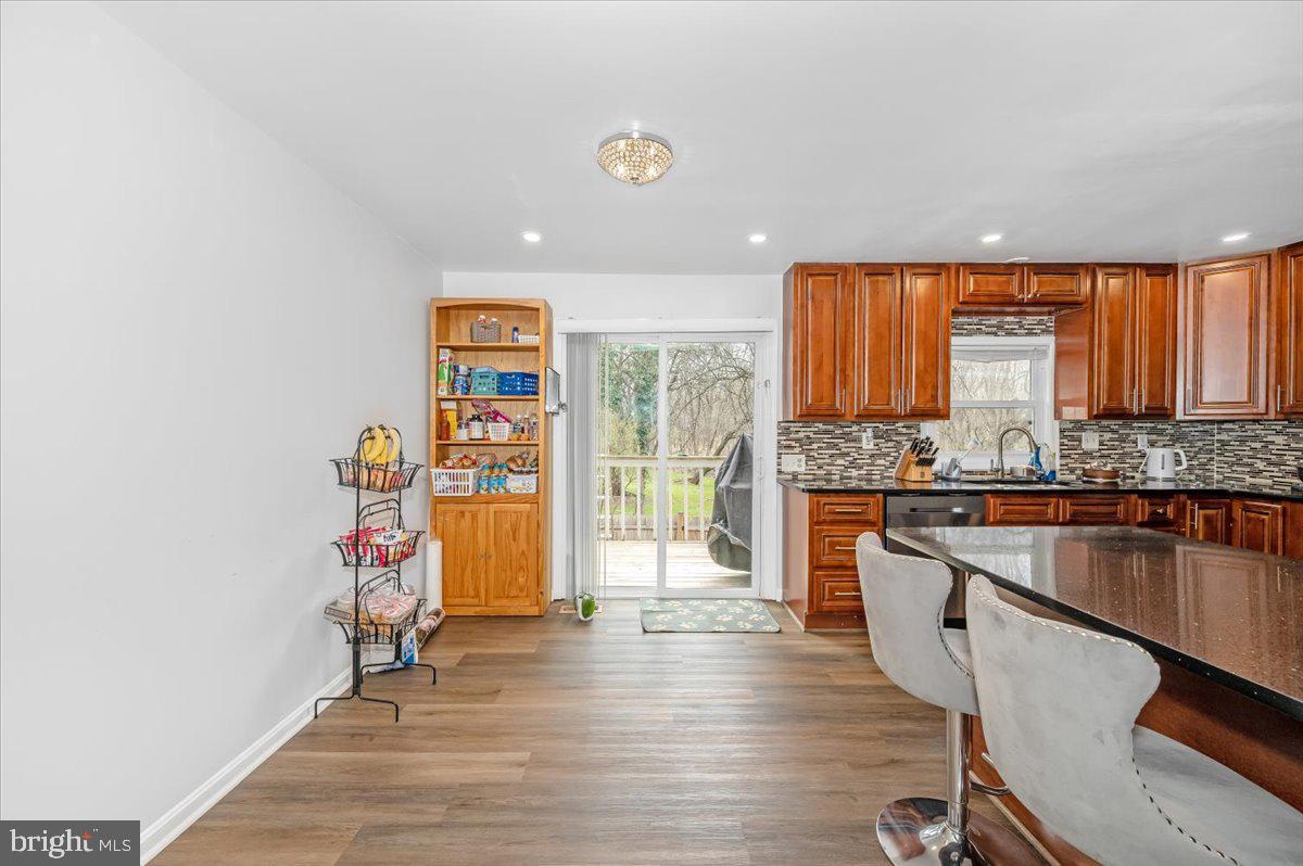 1864 Murdock Court Frederick, MD 21702 - Photo 6 of 39 a view of a kitchen with a sink dishwasher and a fireplace
