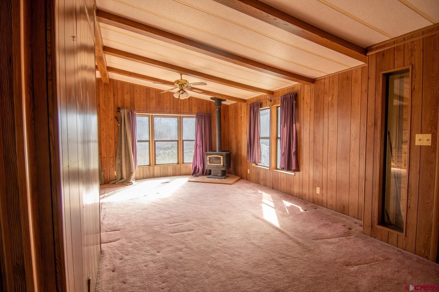 17240 Rd G Cortez, CO 81321 - Photo 14 of 37 a view of empty room with floor to ceiling window