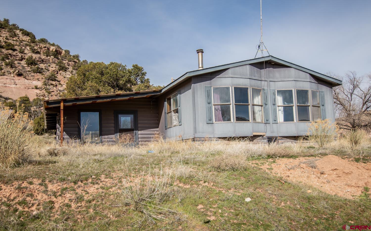 17240 Rd G Cortez, CO 81321 - Photo 27 of 37 a view of a house with a yard