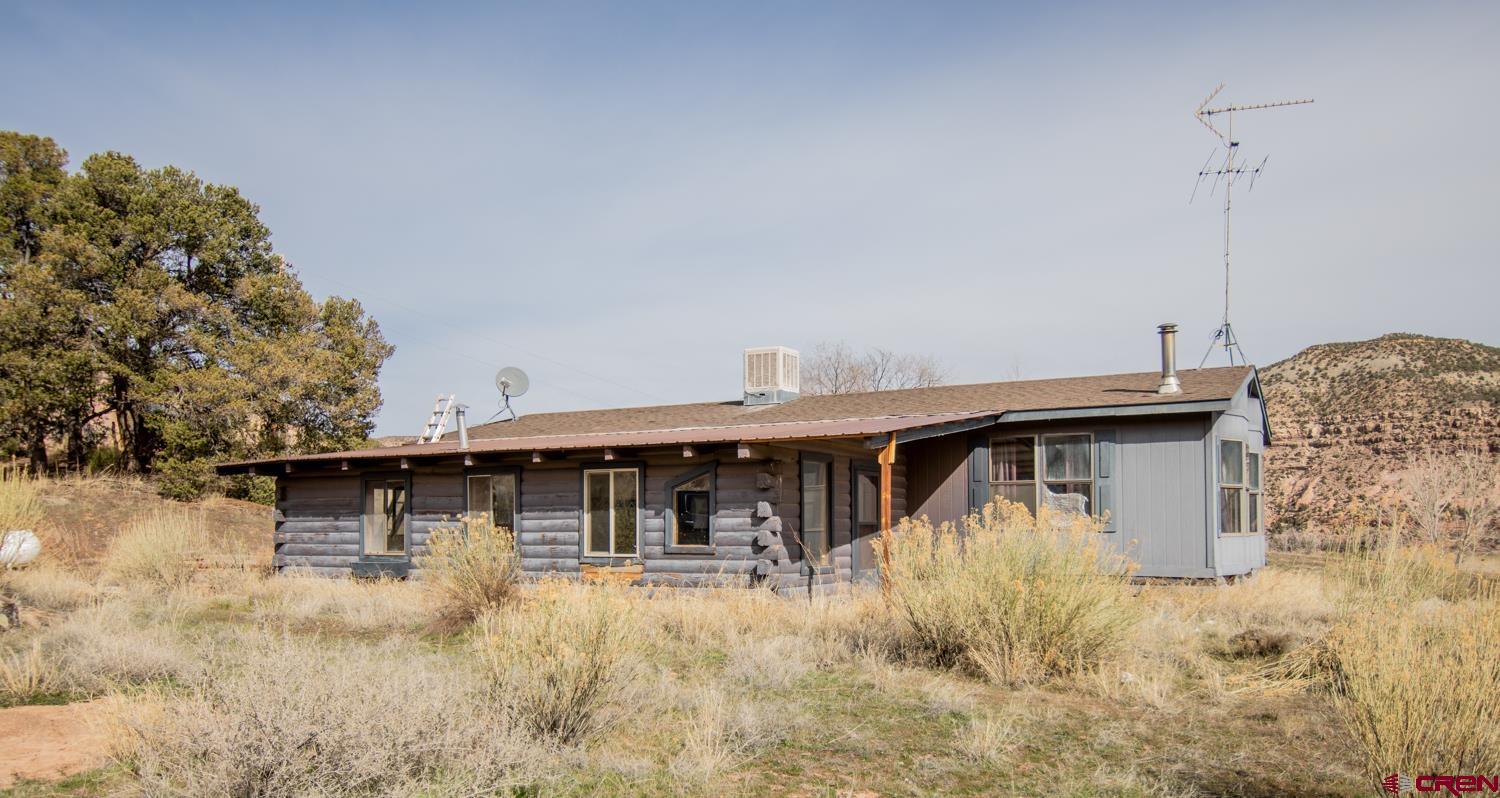 17240 Rd G Cortez, CO 81321 - Photo 30 of 37 a view of a house with pool