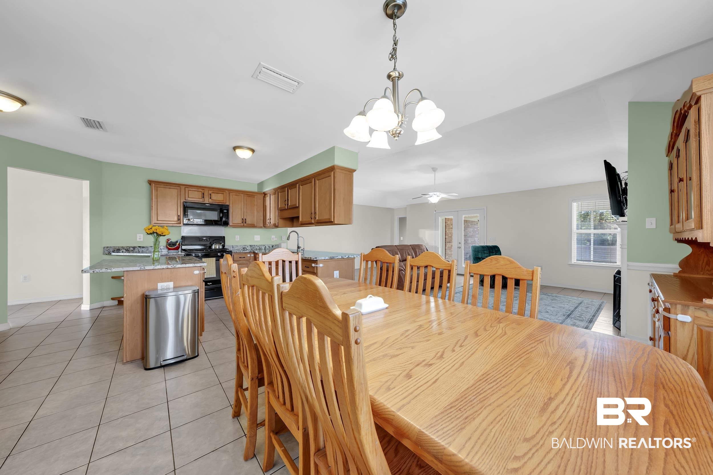 31527 Heidelbrook Loop Daphne, AL 36527 - Photo 9 of 22 Dining space featuring suspended lighting, a ceiling fan, and light tile patterned floors