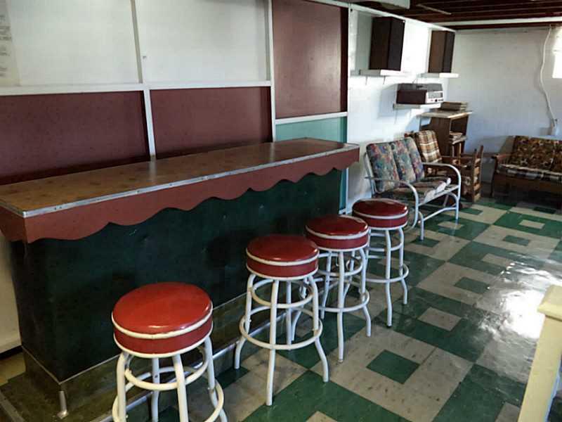 1237 Rosecrest Avenue Monessen, PA 15062 - Photo 13 of 17 Basement/Game Room. A real retro bar