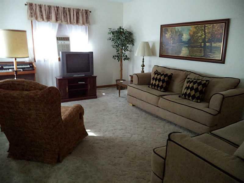 1237 Rosecrest Avenue Monessen, PA 15062 - Photo 3 of 17 Living Room. The living room is large and bright