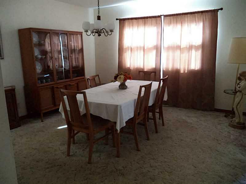 1237 Rosecrest Avenue Monessen, PA 15062 - Photo 5 of 17 Dining Room. The dining room is large and can easily hold a big dining room set
