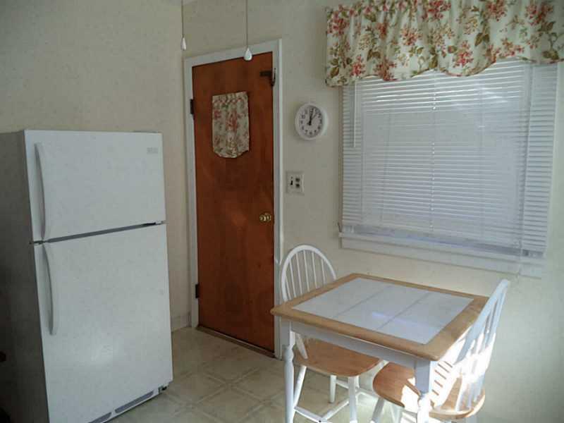 1237 Rosecrest Avenue Monessen, PA 15062 - Photo 7 of 17 Kitchen. A view of the kitchen leading out to the side porch