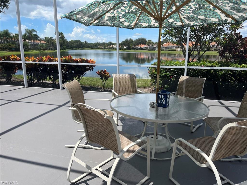 5477 Freeport Lane Naples, FL 34119 - Photo 26 of 36 a view of a patio with swimming pool