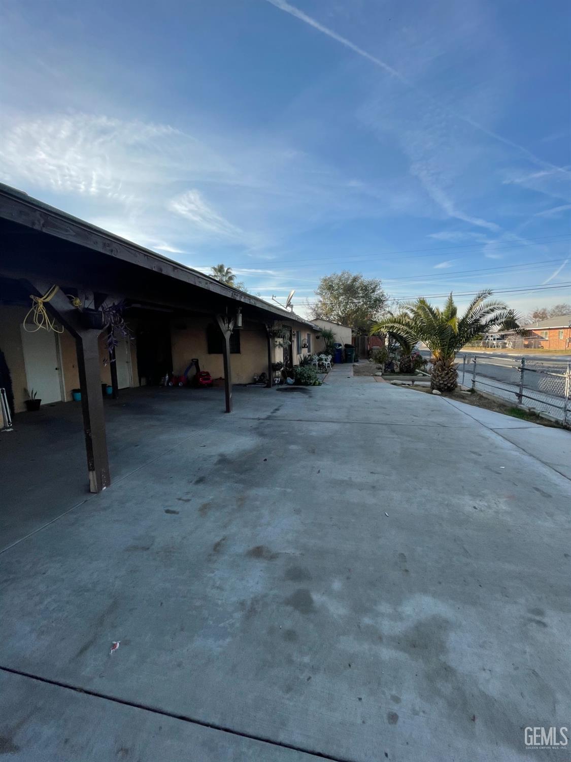 Undisclosed Address Lamont, CA 93241 - Photo 2 of 10 a view of a car garage