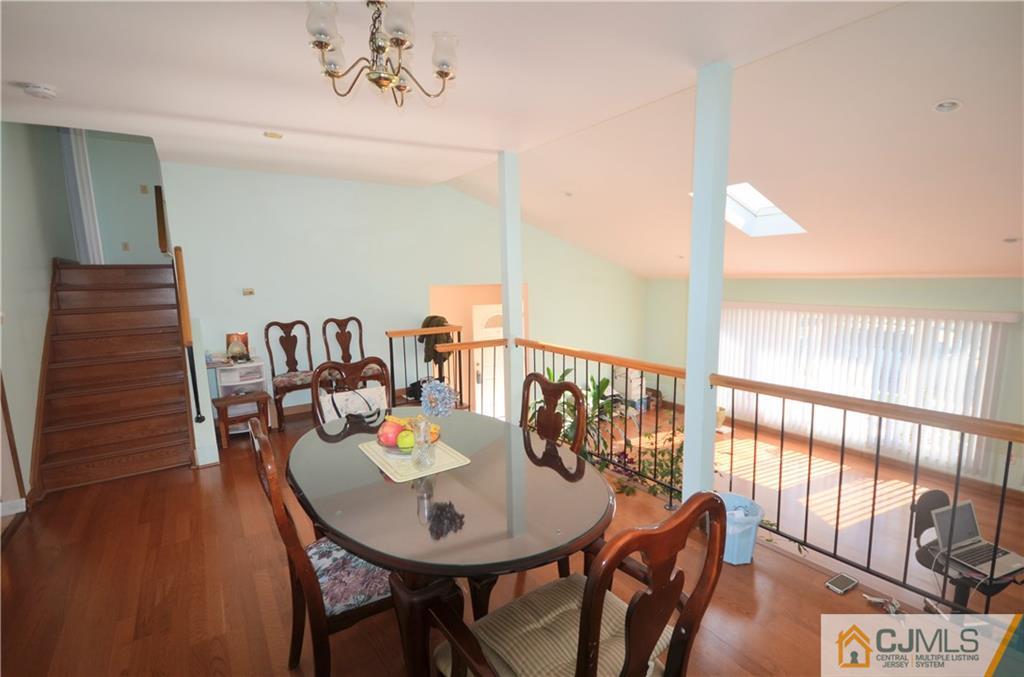 2 Ridge Road Edison, NJ 08817 - Photo 9 of 18 a view of a dining room with furniture window and wooden floor