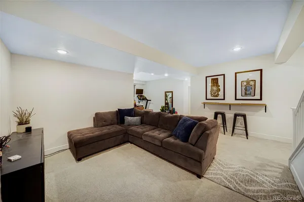 a living room with furniture and a couch
