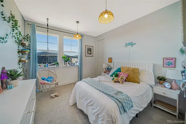 a bedroom with a bed and a cabinets