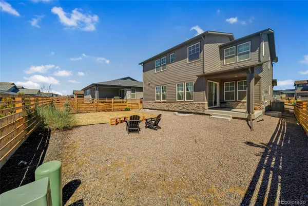 a view of a house with patio porch and furniture
