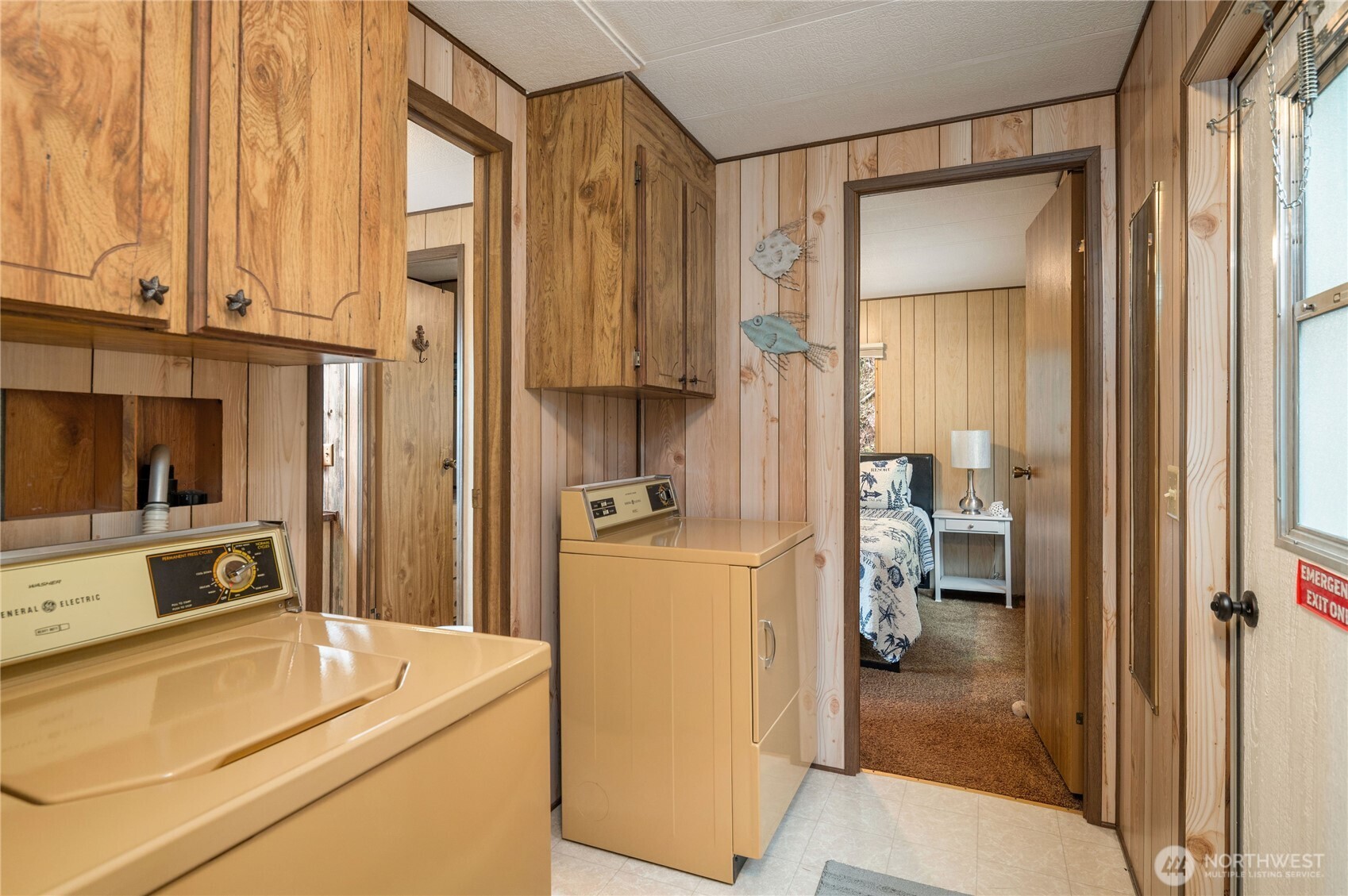 71 Bald Point Court Tahuya, WA 98588 - Photo 12 of 32 a room with a bed and a dresser