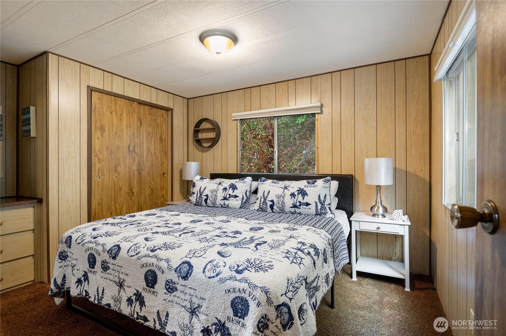 71 Bald Point Court Tahuya, WA 98588 - Photo 14 of 32 a bedroom with a bed and a window