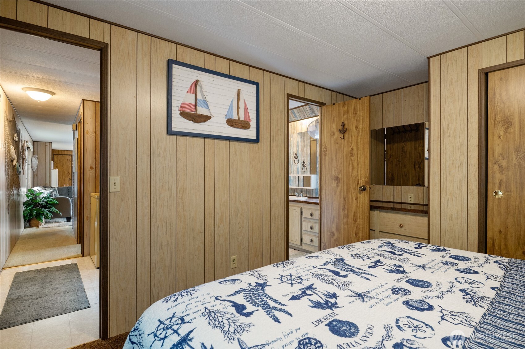 71 Bald Point Court Tahuya, WA 98588 - Photo 15 of 32 a bedroom with a bed and a bathroom