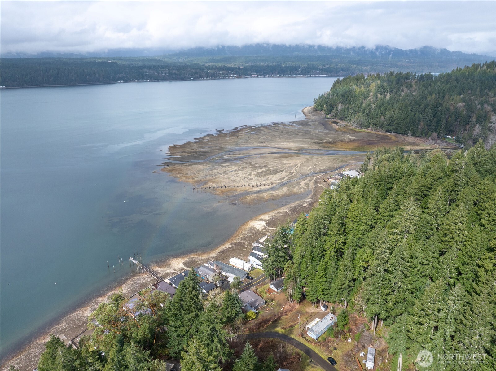 71 Bald Point Court Tahuya, WA 98588 - Photo 19 of 32 a view of a lake with a yard