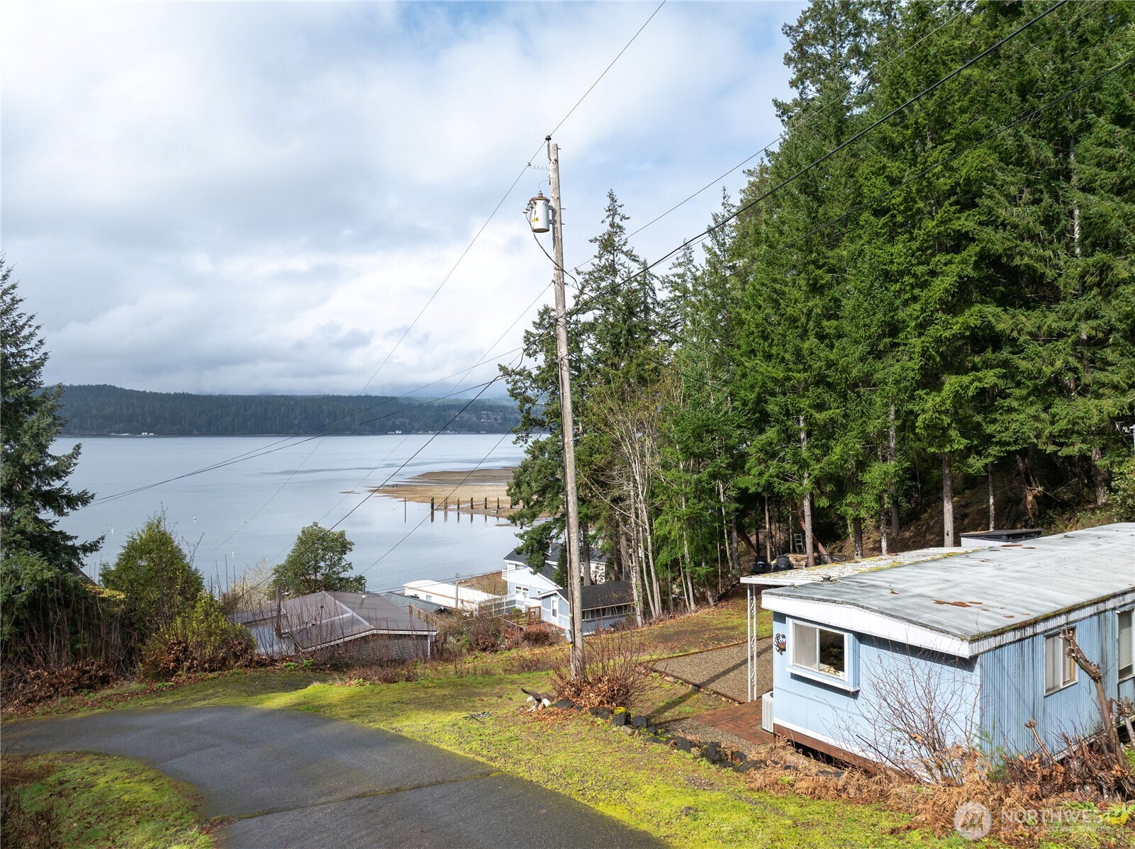 71 Bald Point Court Tahuya, WA 98588 - Photo 20 of 32 a view of a swimming pool with an outdoor space and seating area