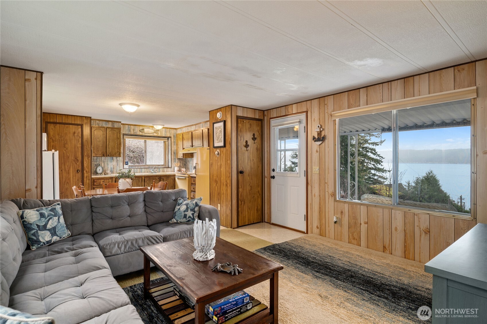71 Bald Point Court Tahuya, WA 98588 - Photo 5 of 32 a living room with furniture and a large window