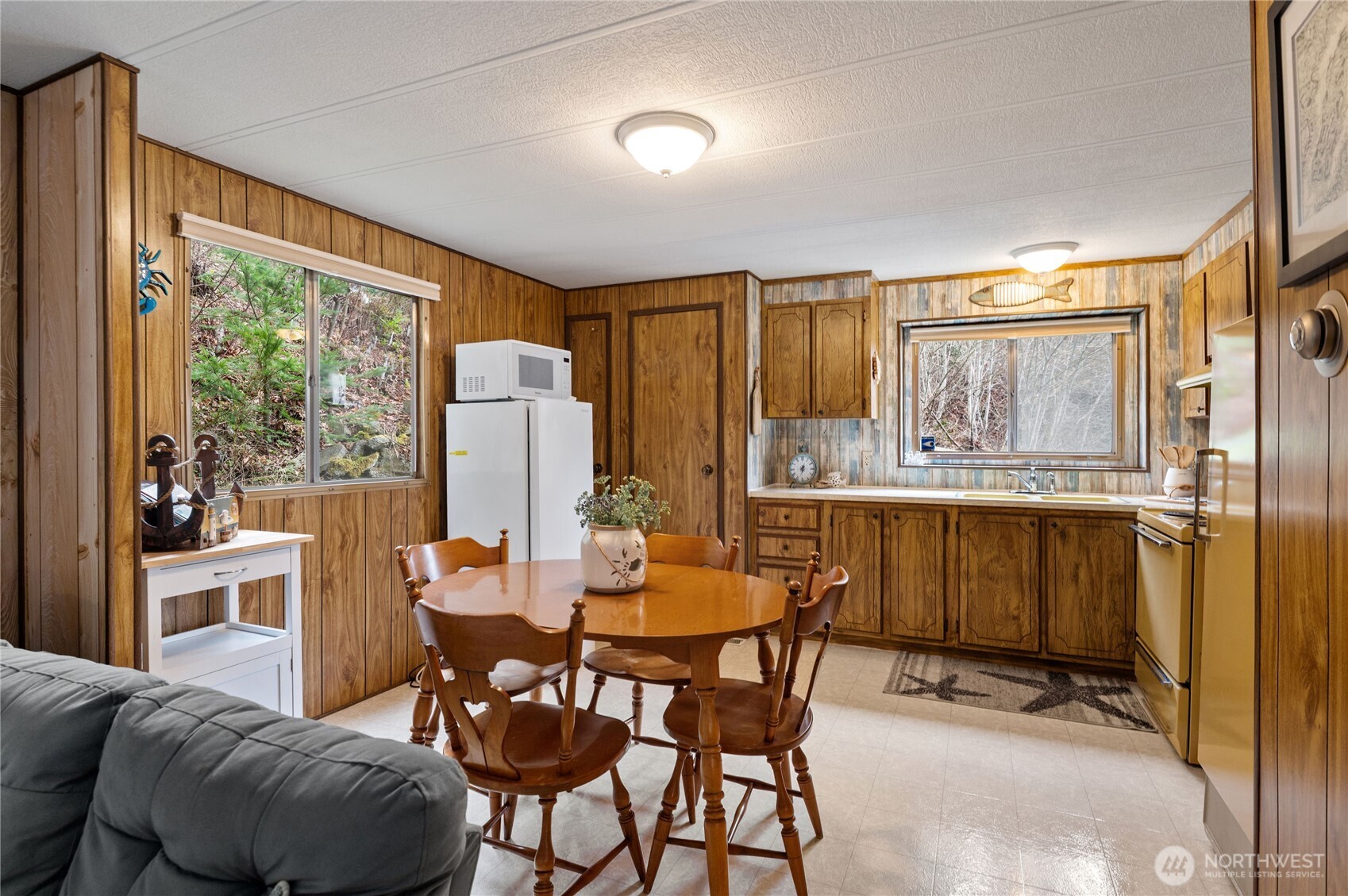 71 Bald Point Court Tahuya, WA 98588 - Photo 7 of 32 a view of a dining room with furniture window and outside view