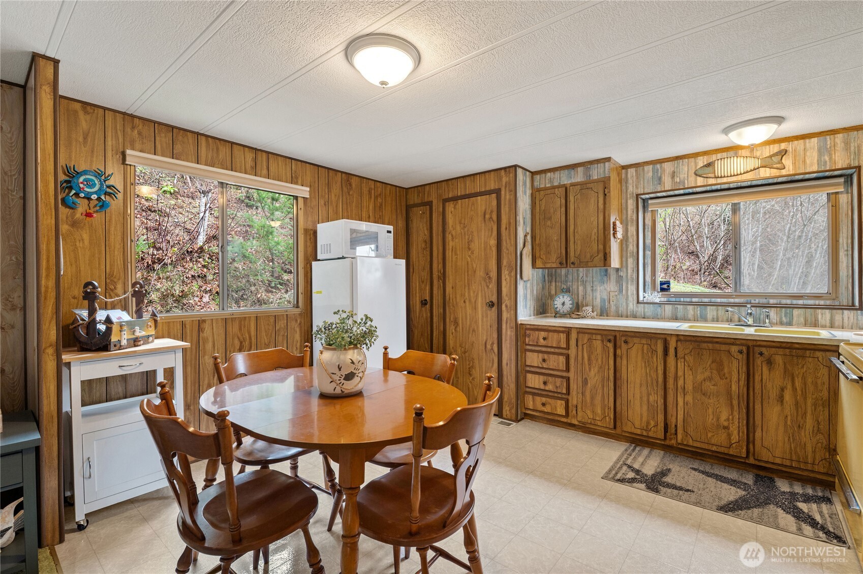 71 Bald Point Court Tahuya, WA 98588 - Photo 8 of 32 a dining room with furniture and window