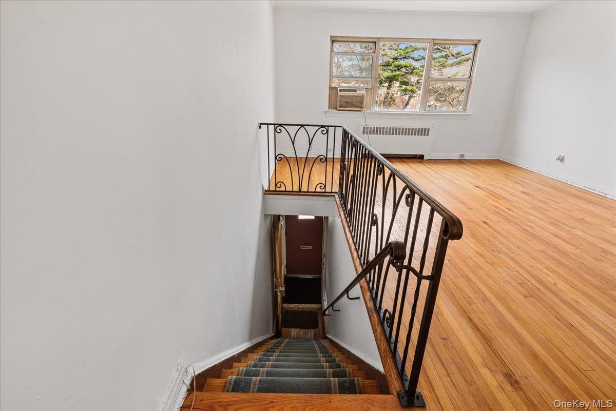 87-24 Marengo Street, Unit 2B Queens, NY 11423 - Photo 18 of 22 a view of balcony and wooden floor