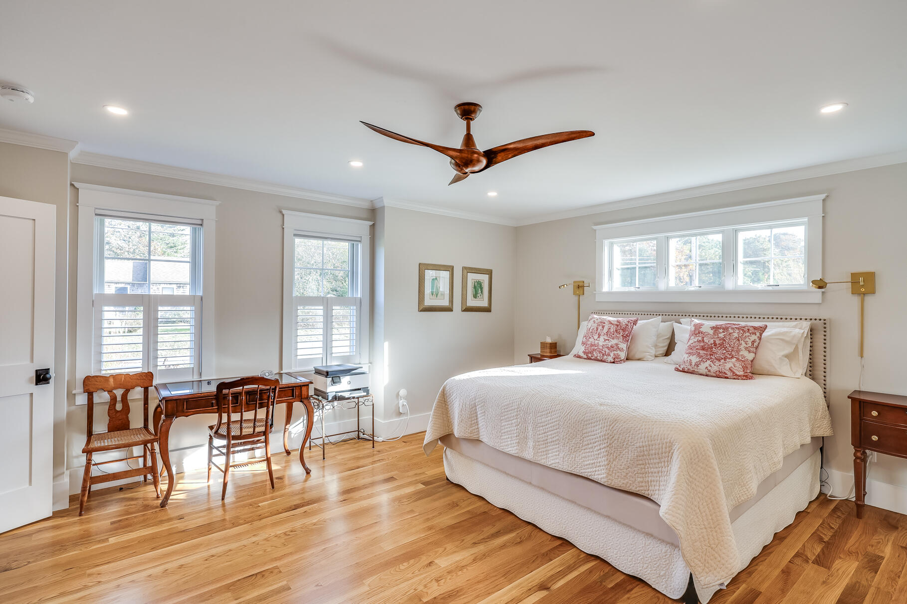 20 Cockle Cove Road South Chatham, MA 02659 - Photo 13 of 42 a bedroom with a bed a table and chairs with wooden floor