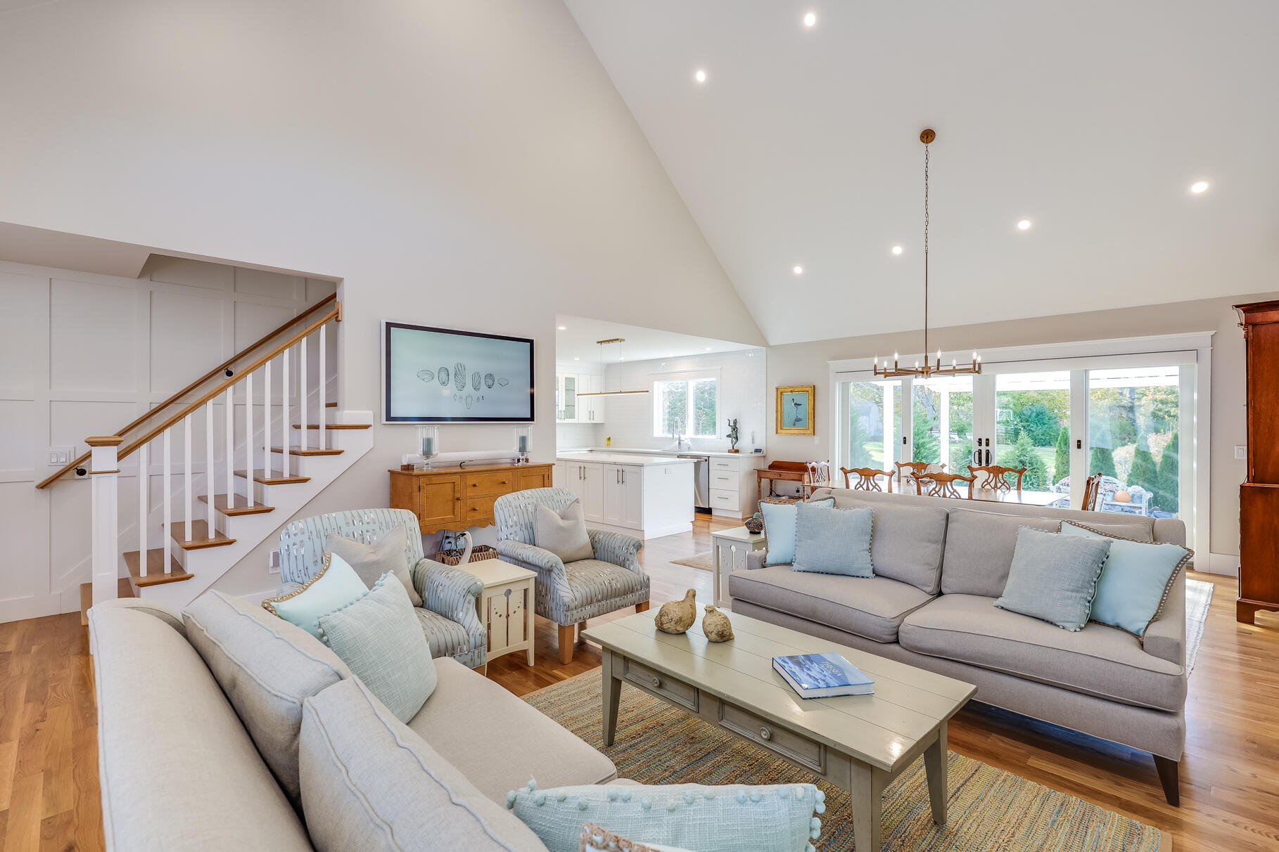 20 Cockle Cove Road South Chatham, MA 02659 - Photo 15 of 42 a living room with furniture ceiling fan and a rug