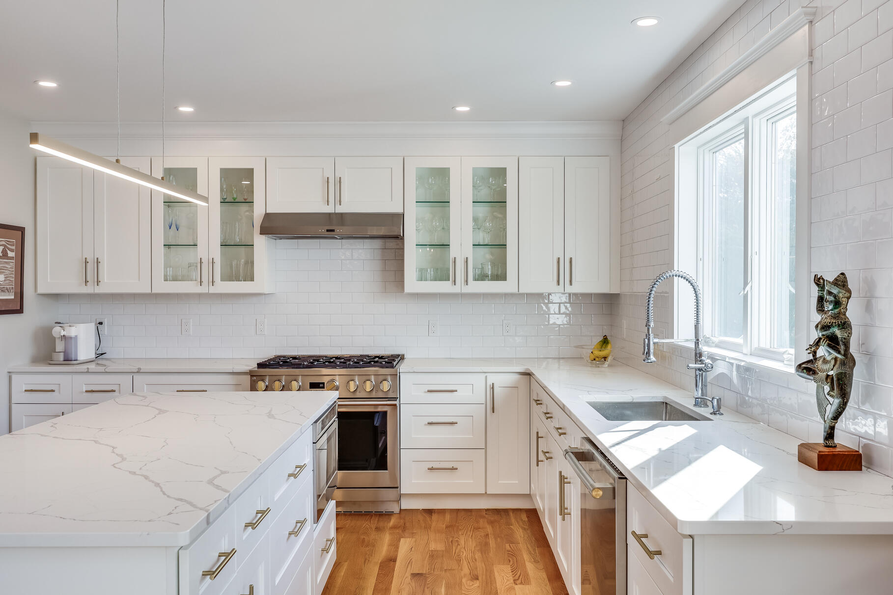 20 Cockle Cove Road South Chatham, MA 02659 - Photo 17 of 42 a kitchen with a sink stove and cabinets