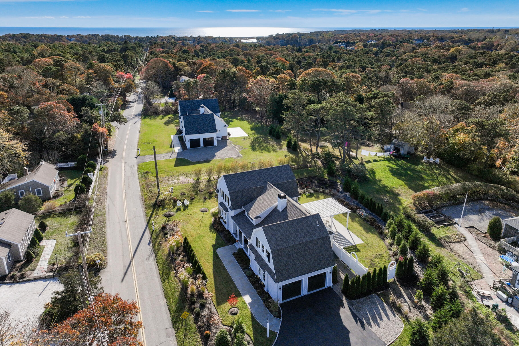 20 Cockle Cove Road South Chatham, MA 02659 - Photo 2 of 42 an aerial view of a house with a swimming pool