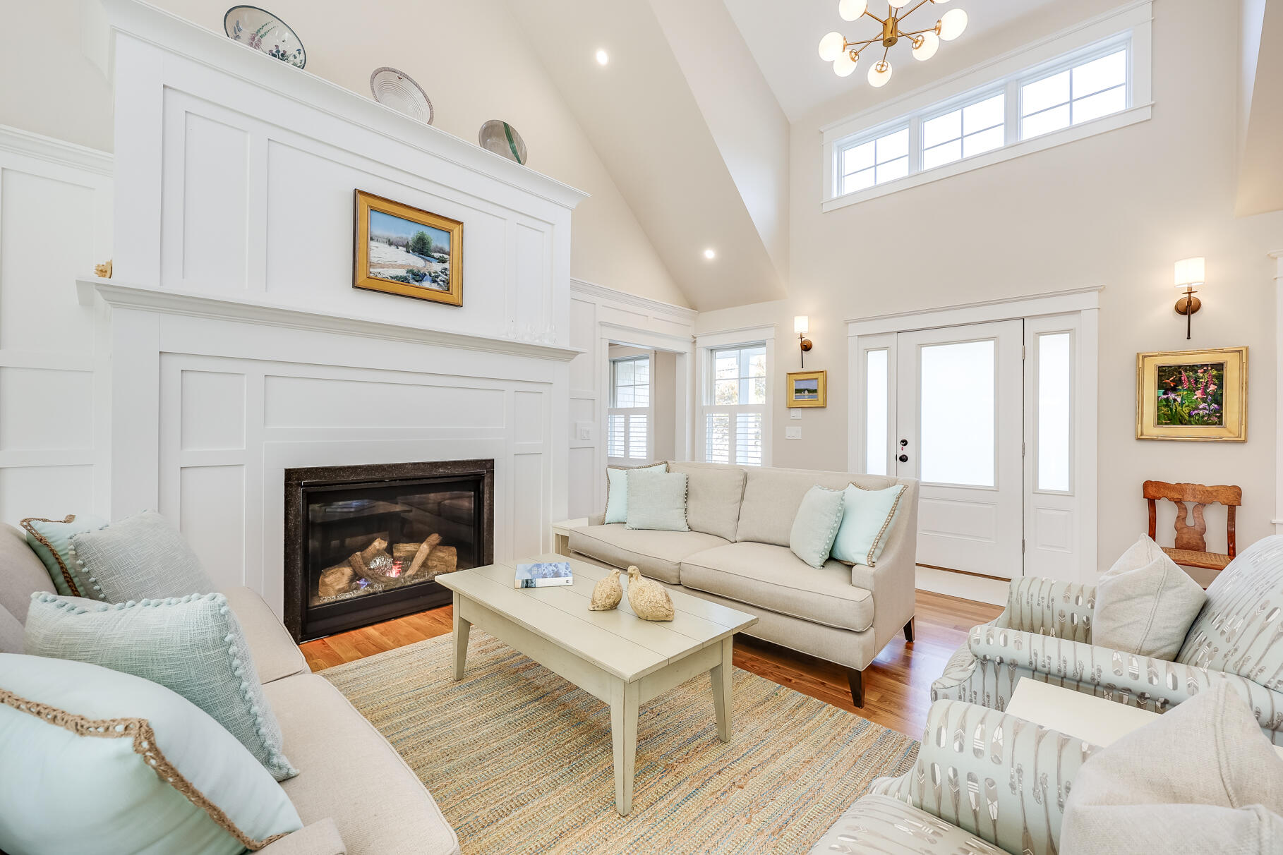 20 Cockle Cove Road South Chatham, MA 02659 - Photo 3 of 42 a living room with furniture and a fireplace