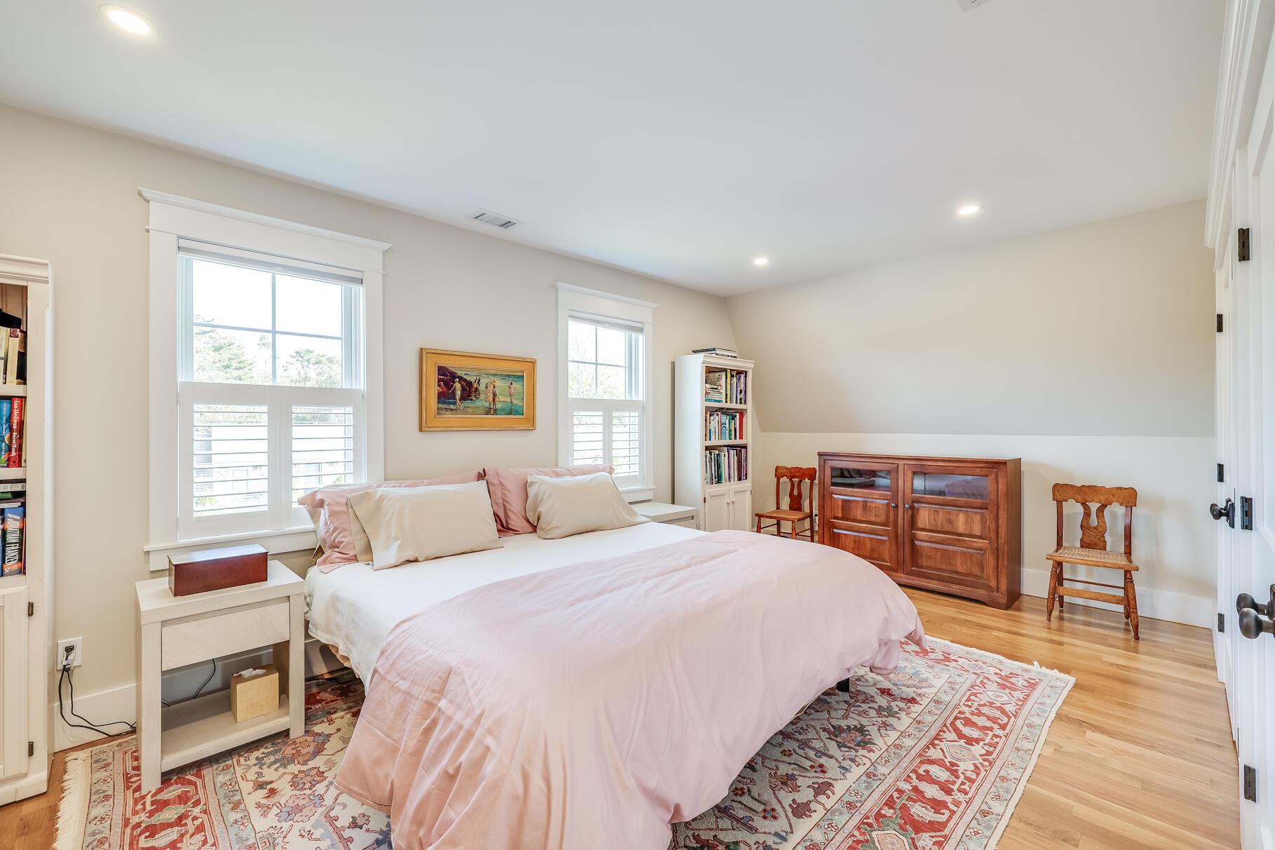 20 Cockle Cove Road South Chatham, MA 02659 - Photo 34 of 42 a bedroom with a bed and wooden floor
