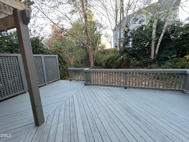 a view of deck with wooden floor and outdoor seating