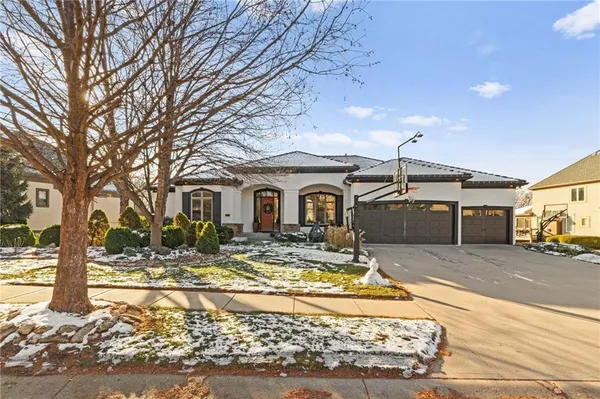 $999,000 | 2421 Northeast Lake Breeze Drive, Lee's Summit, MO 64086